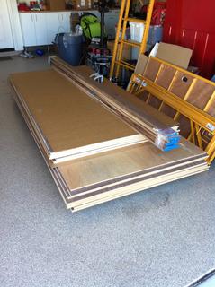 Started with 14 sheets of walnut veneer plywood and mdf. I had to special order this since i wanted 4x10 sheets to go from floor to ceiling without a seam.